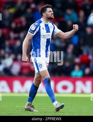 Colchester United's Connor Hall celebrates their side's second goal of the game during the Sky Bet League Two match at Brisbane Road, London. Picture date: Saturday March 18, 2023. Stock Photo