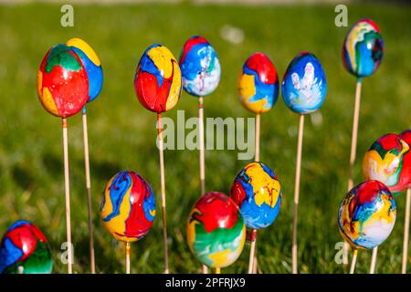 Poppy colorful Easter eggs with different colors uniquely hand-painted Stock Photo