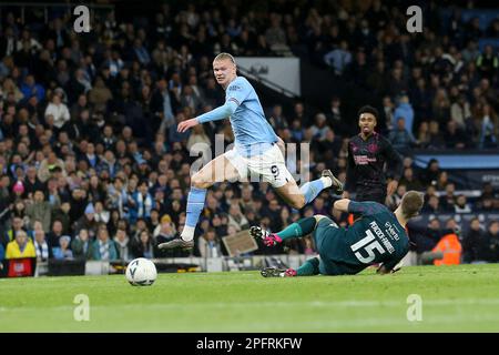 Manchester, UK. 18th Mar, 2023. Erling Haaland of Manchester City shoots and scores his teams 1st goal. Emirates FA Cup quarter-final match, Manchester City v Burnley at the Etihad Stadium in Manchester, Lancs on Saturday 18th March 2023. this image may only be used for Editorial purposes. Editorial use only, pic by Chris Stading/Andrew Orchard sports photography/Alamy Live news Credit: Andrew Orchard sports photography/Alamy Live News Stock Photo