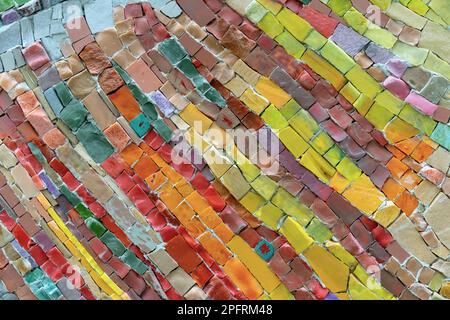 Colorful stone mosaic with chaotic pattern, seamless. Marble-stone mosaic texture. Stock Photo