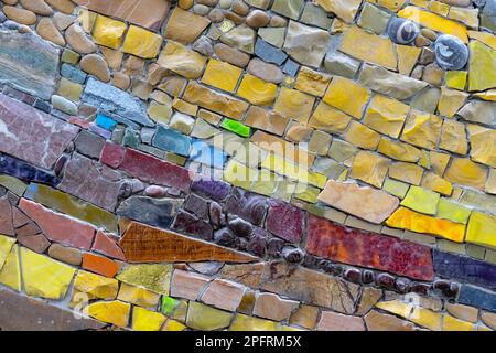 Colorful stone mosaic with chaotic pattern, seamless. Marble-stone mosaic texture. Stock Photo