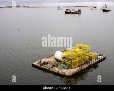 A lobster trap, lobster pot or lobster cage is a portable trap that traps lobsters or crayfish. Stock Photo