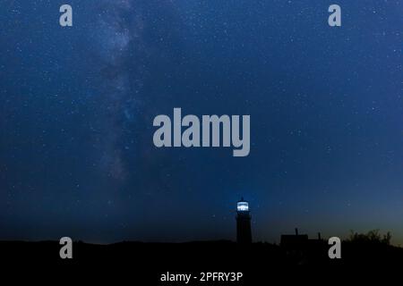 Highland Lighthouse under milky way in Cape Cod National Seashore, Massachusetts Stock Photo