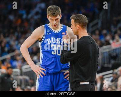 March 18, 2023: Duke head coach Jon Scheyer talks to Duke center Kyle Filipowski (30) during the 2nd half of a second-round college basketball game in the men's NCAA Tournament between Duke Blue Devils and Tennessee Volunteers. Tennessee defeated Duke 65-52 at Amway Center in Orlando, FL. Romeo T Guzman/CSM. Stock Photo