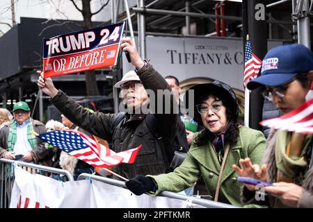 Donald Trump Supporters hold signs in support of his 2024 campaing for the United States Presidency during the Saint Patrick's day parade in New York, United States on march 17, 2023. Photo by: Wendy P. Romero/Long Visual Press Stock Photo