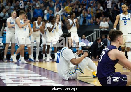 Sacramento, CA, USA. 18th Mar, 2023. UCLA Bruins guard Tyger Campbell (10) sits on the court after he was fouled by Northwestern Wildcats guard Brooks Barnhizer (13).during a game in the NCAA Tournament at Golden 1 Center in Sacramento, Saturday, March 18, 2023. Princeton Tigers beat the Missouri Tigers 78-63. (Credit Image: © Paul Kitagaki Jr./ZUMA Press Wire) EDITORIAL USAGE ONLY! Not for Commercial USAGE! Stock Photo