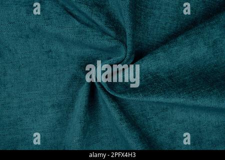 Turquoise fabric texture - top view and close-up of a piece of crushed and twisted turquoise linen Stock Photo