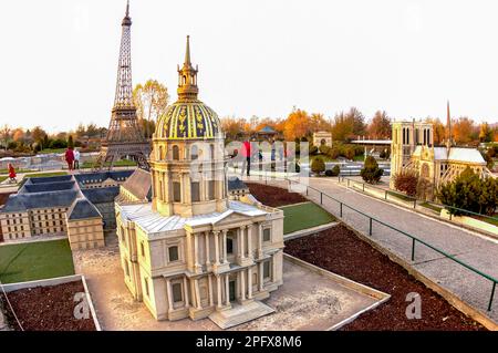 Paris, France - Tourists Visiting, Theme Park, in Suburbs, France Miniature, with Architectural Scale Models of French Monuments.   Invalides & Eiffel Tower. Stock Photo