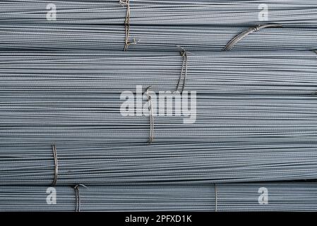 Warehouse of metal building rebar. Abstract texture with lines. Background for design on an industrial theme Stock Photo