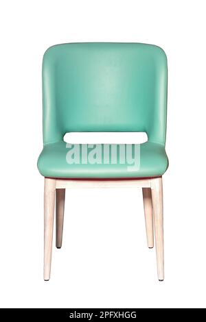 Dining chair with light wood legs and solid leather seat and light green top. The image is isolated on a white background. Stock Photo