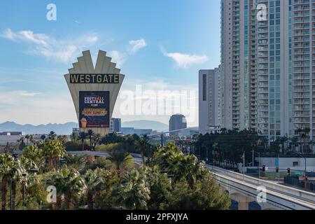 A picture of the Westgate Las Vegas Resort and Casino billboard and the nearby palm trees and apartments. Stock Photo