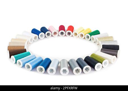 Set of colorful spools of thread on white background Stock Photo