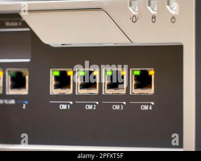 Ethernet ports of communication equipment in a test mode Stock Photo