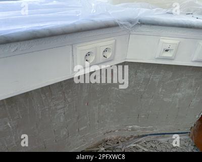 Exposed concealed wall electric heating without plaster Stock Photo