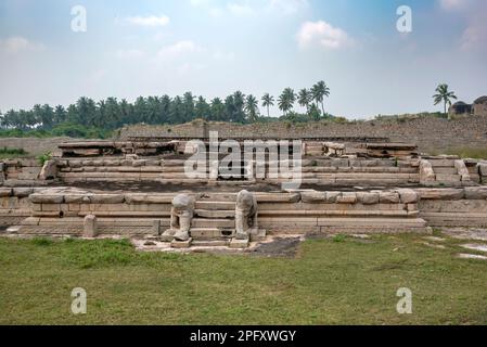 Base of completely destroyed palace in royal enclosure in Hampi. Hampi, the capital of Vijayanagar Empire, is a UNESCO World Heritage site. Stock Photo