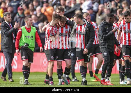 Sheffield, UK. 19th Mar, 2023. Goalscorer of the winning goal Tommy Doyle #22 of Sheffield United celebrates his teams win with teammates after the Emirates FA Cup Quarter-Finals Sheffield United vs Blackburn Rovers at Bramall Lane, Sheffield, United Kingdom, 19th March 2023 (Photo by Mark Cosgrove/News Images) in Sheffield, United Kingdom on 3/19/2023. (Photo by Mark Cosgrove/News Images/Sipa USA) Credit: Sipa USA/Alamy Live News Stock Photo