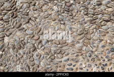 Pebble stone floor texture background for exterior design. Stock Photo