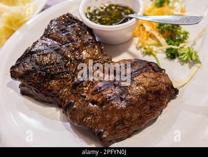 Restaurants and cafes of Buenos Aires serving Argentinian meat in trendy district of Recoleta. Stock Photo