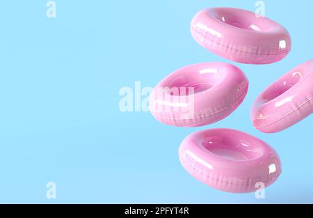 Pink inflatable circle banner template with copy space for text. Summer time concept. Beach accessories isolated on blue background. Summer wallpaper. Stock Photo