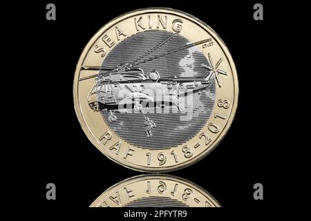 Reverse side of  2018 £2 coin, featuring a Sikorsky Sea King helicopter The coin is part of a set of 5. Stock Photo