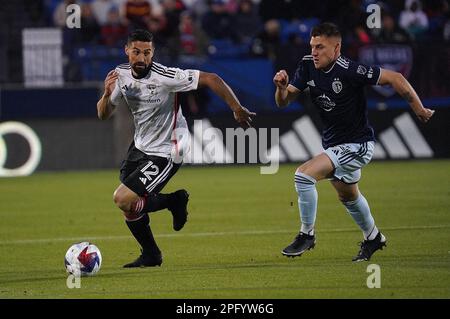 Frisco, United States. 18th Mar, 2023. March 18, 2023, Frisco, United States: FC Dallas midfielder Sebastian Lletget is chased by Sporting KC midfielder Remi Walter during first half action of the MLS game between FC Dallas and Sporting KC at Toyota Stadium on March 18, 2023 in Frisco, Texas. (Photo by Javier Vicencio/ Credit: Eyepix Group/Alamy Live News Stock Photo