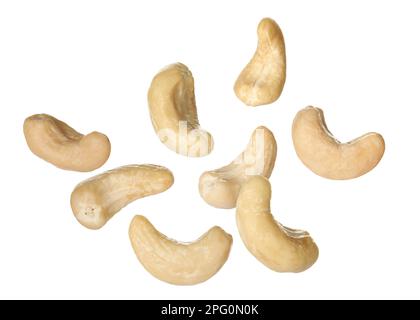 Tasty raw cashew nuts falling on white background Stock Photo