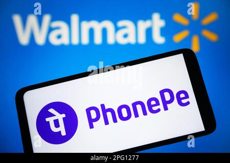 Ukraine. 19th Mar, 2023. In this photo illustration, a PhonePe logo is seen on a smartphone with a Walmart Inc. logo on the background. Credit: SOPA Images Limited/Alamy Live News Stock Photo