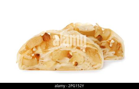 Pieces of delicious apple strudel with almonds on white background Stock Photo