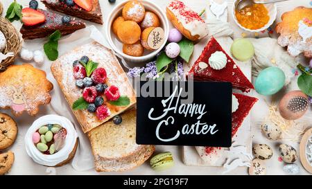 Easter desserts  table.  Sweet easter holiday concept with holiday decorations. Top view Stock Photo