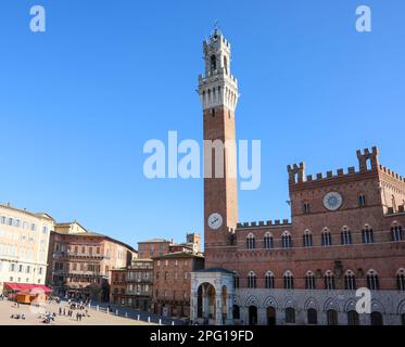 Tower called del Mangia in The Main Square of the City of Siena in Tuscany in Central Italy Stock Photo