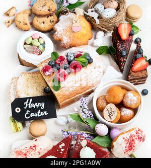Easter desserts  table.  Sweet easter holiday concept with holiday decorations. Top view Stock Photo
