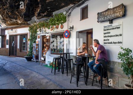 Bars and restaurants in La Cuevas de la sombra street, it is one of the most typical streets of Setenil de las Bodegas  Setenil de las Bodegas is a to Stock Photo