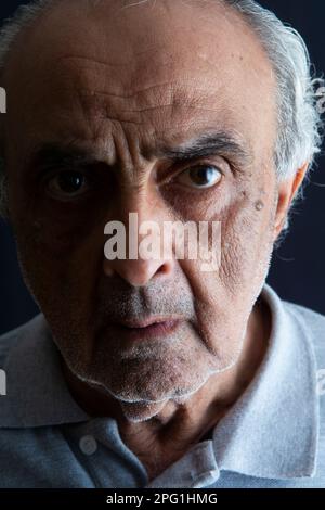 Angry old man staring Stock Photo