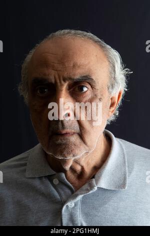 Angry old man looking away Stock Photo
