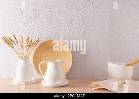 Contemporary White Kitchen with Concrete Countertop, Pull-Out Cutting Board  Stock Photo - Alamy