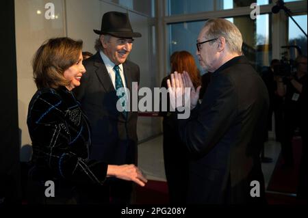 Rep. Nancy Pelosi D Calif. left and her husband Paul Pelosi talk