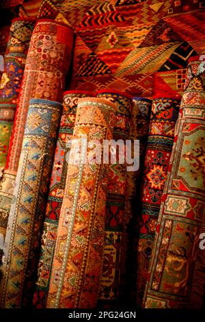 Artisanal carpets for sale in the souk Stock Photo