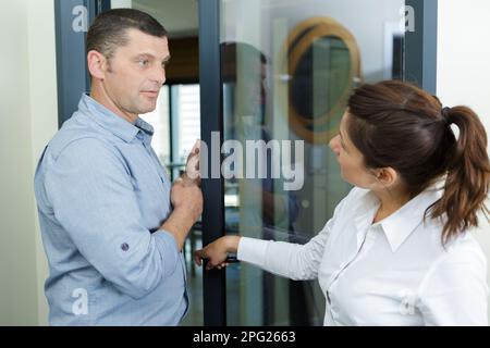 business man and woman discussing work Stock Photo