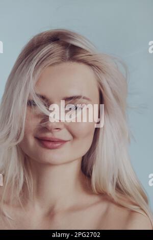 Blond woman portrait, healthy hair Stock Photo