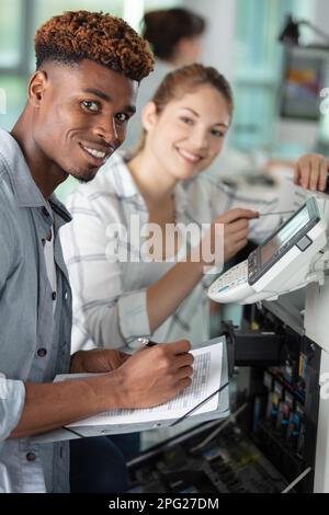 engineering students using an innovative printer Stock Photo