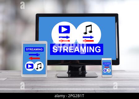 Streaming concept shown on different information technology devices Stock Photo