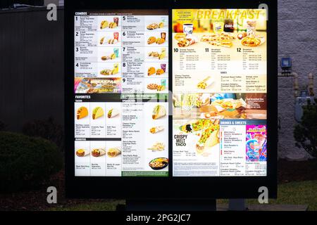 The drive through menu at Taco Bell, a fast food restaurant on Northern Boulevard in Flushing, Queens, New York City Stock Photo