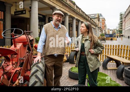 London, UK.  20 March 2023. (L) Dickon Tyrell as Mr McGregor and Sarah Cullum at a photocall for The Peter Rabbit Easter Adventure in Covent Garden Piazza.  Live performances and puppetry create a visitor experience accompanying Beatrix Potter on a mission to rescue Jemima Puddle-Duck from the clutches of Mr. McGregor.  The show runs this Easter from 21 March to 16 April.  Credit: Stephen Chung / Alamy Live News Stock Photo