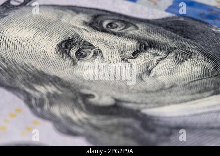 The expression of Benjamin Franklin on the 100 dollar bill Stock Photo