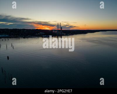 An aerial view of the Port Jefferson Harbor during a beautiful and cloudless sunset in the winter Stock Photo