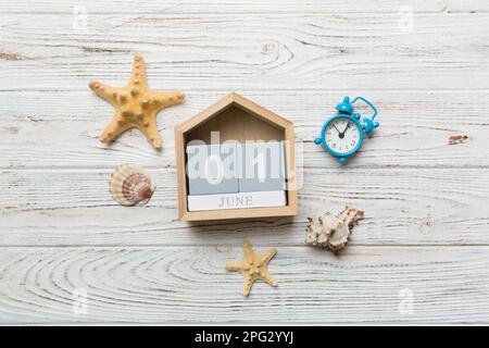 June 1th. Image of june 1 wooden calendar on colored background. Summer day. Empty space for text. Stock Photo