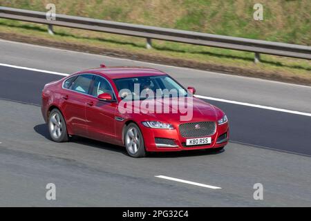 2018 Red JAGUAR XF D R-SPORT 1999cc Diesel 8 speed automatic;  travelling on the m6 motorway, UK Stock Photo
