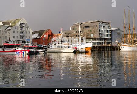 Harbour and waterfront. Tromso or Tromsoe during winter in the northern part of Norway. Europe, Scandinavia, Norway, March Stock Photo