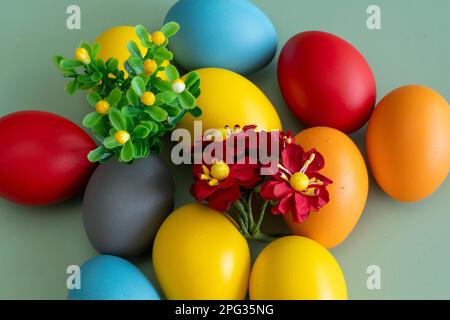 colorful eggs symbolize easter. Easter minimal concept. Creative Happy Easter, spring layout. Stock Photo