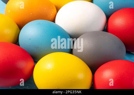 eggs painted in different colors to symbolize the passage of Christian Easter Stock Photo